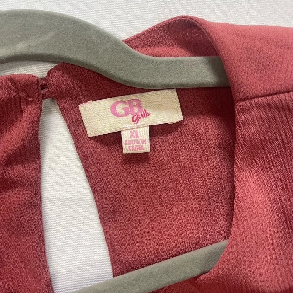 GB girls romper. Beautiful bell sleeves and a key hole back, it’s lined!